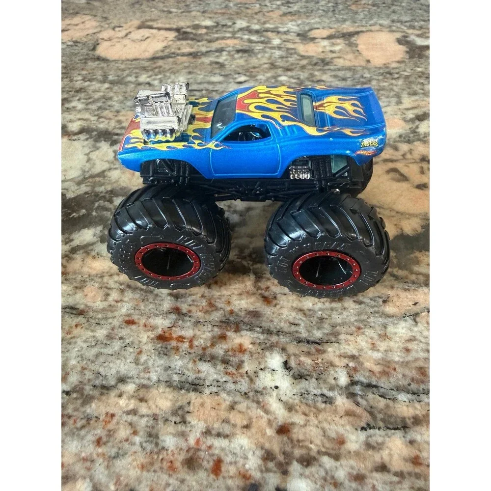 Hot Wheels Monster Jam Trucks Rodger Dodge - Blue w/ Red Rims  1:64 Scale